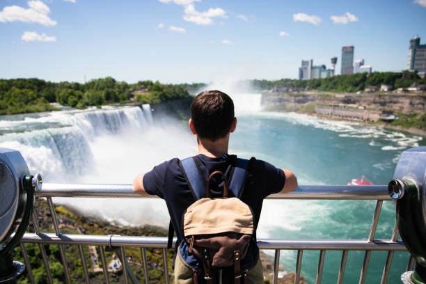 Woman traveler with luggage at Canadian destination